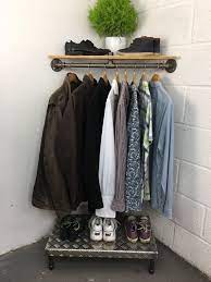 Then, install the window panel on to the wall using nails or hooks. Corner Clothes Rack Novocom Top