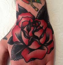 Red Black Flower Tattoo For Hand And Wrist Pictures Fashion Gallery Hand Tattoos Traditional Hand Tattoo Hand And Finger Tattoos
