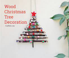 Now, for this tree, i let the center stick hang down below the tree shape and used it as the trunk of the tree. Recycled Wood Christmas Tree Decoration Twig Christmas Tree Wood Christmas Tree Recycled Christmas Tree