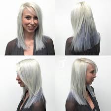 Our favorite celebrity side bang hairstyles. Silver Two Toned Layered Cut With Clean Blunt Lines And Side Swept Bangs By Hairstyleology Medium