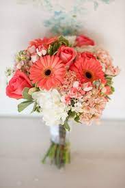 Brides are leaving pale pink behind in favor of flowers with warmer, bolder hues. Color Inspiration Perfect Coral And Gold Wedding Ideas Modwedding