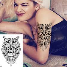 This creative tattoo is quite interesting to say the least. Neue Grosse Arm Eule Tattoo Hulse Flash Temporare Tattoo Aufkleber Wasserdicht Henna Tatoo Frauen Korper Kunst Mandala Eule Geisha Leopard Temporare Tattoos Aliexpress