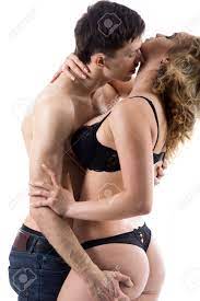 Beautiful Half Naked Couple Love Play, Young Man In Jeans Holding Girl In  Black Lingerie, Kissing Her In The Neck, Studio Shot, White Background  Stock Photo, Picture and Royalty Free Image. Image