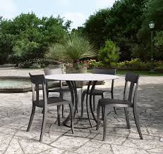 The Papatya Toro S Ratan Dining Chair With The Onyx Table Outdoor Furniture Sets Outdoor Furniture Furniture Design Modern