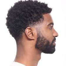 The hairstyle is cut in such a way that all the hairs of the top are cut in a pattern of the circle and the hairs from the sides are cut very short. Black Men Haircuts To Try For 2021 All Things Hair Us