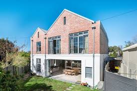Sun Filled Contemporary Family Home Houses For Rent In Cape Town Renting A House House Exposed Brick