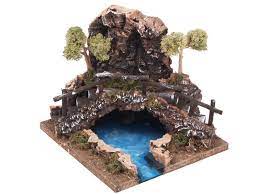 Per fare la grotta del presepe è necessario un po' più di tempo, ma è un qualcosa che puoi tenere anche per gli anni a seguire. Laghetto Nella Grotta Con Ponte Vendita Online Laghetto Nella Grotta Con Ponte Accessori Per Presepe Presepe Ornamenti Di Natale Fai Da Te Natale