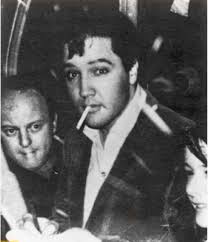 October 21, 1961: Elvis officially hired Marty “Moon” Lacker. Marty, was a  close "Memphis Mafia" entourage friend to Elvis and he was one of two "Best  Men" at Elvis' May 1, 1967