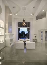 Add shelves, bookcases and glass cabinets to furnish walls. High Ceiling Living Room Modern Living Room Miami By Interiors By Brown Houzz