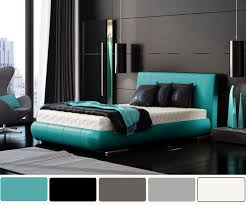 Black canopy bed, zebra bench, turquoise blue lamps and black nightstands. Turquoise And Gray Bedroom Ideas Novocom Top