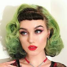The dark gray roots provide depth and contrast to silver lengths. 40 Pin Up Hairstyles For The Vintage Loving Girl