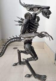 Scrap Metal Sculpture Alien Made From Unusable Engine Parts And Other Junk Motor Components Scrap Metal Art Metal Sculpture Metal Artwork