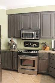If i had to pick a direction without the floors being exposed, i would keep the kitchen walls a white (bm dove white maybe) to keep that area very bright due to the gray cabinets. Kitchen Mini Makeover Kitchen Cabinets Makeover New Kitchen Cabinets Home Kitchens
