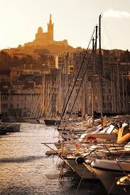 Sunset On The Old Port Of Marseille With A View On The Iconic Church Notre Dame De La Garde Built At The Highest With Images Places To Travel Places To See France Travel