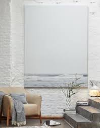 Wohnen In Weiss Weisse Wand Kombiniert Mit Beigetonen Grau Und Holz Weisse Mobel Wohnen Einrichtungsideen Wohnzimmer Modern