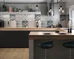 Grey kitchen with wooden cabinets, granite worktop and white cupboards. Tiles And Terrazzo Tilesterrazzo Twitter