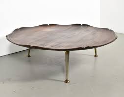 Here's a coffee table that's 16 inches high with 31.5 in diameter. Italian Curved Wood Coffee Table With Brass Legs 1960s 123553