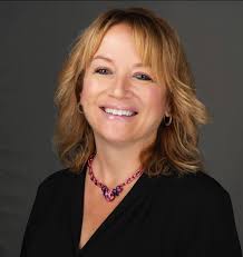 How do introverts feel when someone smiles at them?