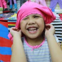 Retired Army Private 1st Class Kevin Baker combs his