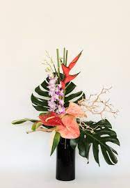 Maybe you would like to learn more about one of these? Send Tropical Forest In San Jose Ca From Flowers By Ivy The Best Florist Flower Arrangements Simple Tropical Flower Arrangements Tropical Floral Arrangements