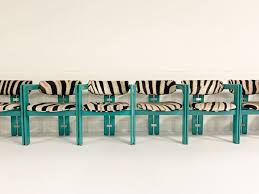 One of the most common prints around for dining room chairs, the black and white colors are fairly neutral and will match most other neutral décor and furniture. Augusto Savini Pamplona Dining Chairs In Zebra Set Of 8 1960s Artsy