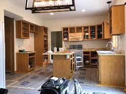 white kitchen cabinet painting in apple