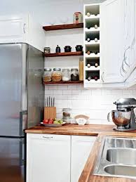 Glass open shelves on gold brackets display vintage dishes. 2021 Marvelous Kitchen Storage Ideas By Smart And Simple Ways