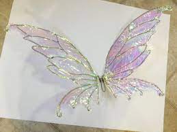 How To Make Diy Fairy Wings With Cellophane An Easy To Follow Tutorial Diy Fairy Wings Diy Fairy Fairy Costume Diy