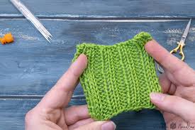 You can just eyeball this; How To Weave In Ends In Knitting 10 Easy Techniques Video