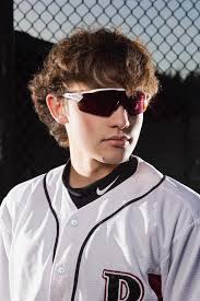 Looking for a photographer to do senior sports pics similar to these  located in Muncie/New Castle area.