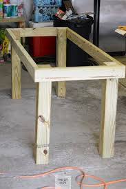 Be sure to make the frame flush with the edge of the plywood, so that there is adequate clearance for the legs. Diy Outdoor Table What To Do With Leftover Composite Decking The Diy Nuts