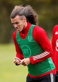 Gareth bale new hairstyle 2018. Gareth Bale Shows Off Incredible Long Hair As Real Madrid Outcast Undoes His Man Bun In Wales Training