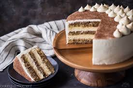 Tiramisu Cake A Layered Italian Espresso Infused Mascarpone Dessert In Cake Form Get Your Tiramisu Cake Tiramisu Cake Recipe Italian Desserts Traditional