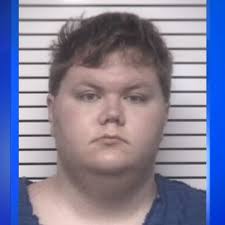 North Carolina man charged after three killed in house fire