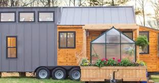 This Gorgeous Tiny Home Features A Greenhouse And Wooden Pergola Tiny House Tiny House Design Home Greenhouse