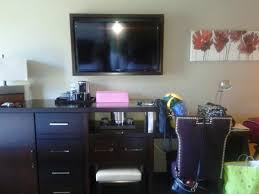 But with space tight, building a whole fridge enclosure off site wasn't practical—the cabinet would be too big and unwieldy to maneuver through the back door and into the kitchen. View From The Bed Large Tv A Safe And Fridge Built Into Cabinet Desk To Right Picture Of Viejas Casino Resort Alpine Tripadvisor