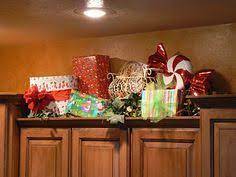 The wall next to the front door. Decorating Top Of Kitchen Cabinets For Christmas Google Search Christmas Kitchen Decor Christmas Deco Christmas Decorations