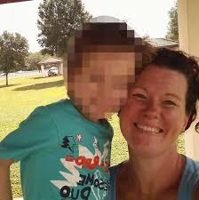 Mum and dad found dead by their car as three young sons sat unharmed inside 