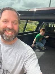 Custom cut bedrug mat for vehicle