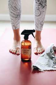 Just mix equal parts white vinegar and water, spray it on both sides of the mat, and gently wipe it off. Diy Yoga Mat Spray Simple Effective The Healthy Maven