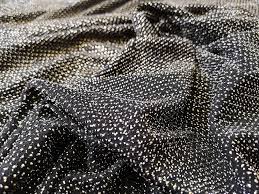 Maybe you would like to learn more about one of these? Buy Metallic Knit Dobby Black At Dalston Mill Fabrics