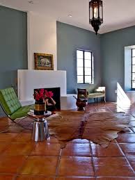 Saltillo tile floors must be sealed with a penetrating tile sealer, and usually a top finish is applied to act as a sort of glaze. Warm And Rustic Saltillo Tiles For Your House Living Room Tiles Tile Floor Living Room Eclectic Living Room