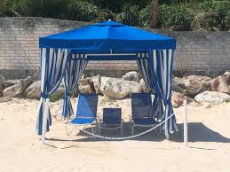 Tropitone Millennia Chaise Lounges Under A Basta Sole Cabana In Bermuda Tropitone Chaise Lounge Outdoor Structures