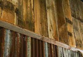 Typically used in ceilings, but is also great for wainscoting, cabinet doors and backs, and even on whole walls. Reclaimed Rustic Tin Wainscoting With 1x12 Rough Sawn Pine From Our Saybrook Il Barn Sangamonhardwoods Used More Than 5 Tin Wainscoting Tin Walls Barn Wood