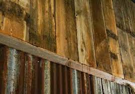 Typically used in ceilings, but is also great for wainscoting, cabinet doors and backs, and even on whole walls. Reclaimed Rustic Tin Wainscoting With 1x12 Rough Sawn Pine From Our Saybrook Il Barn Sangamonhardwoods Used More Than 5 Tin Wainscoting Tin Walls Barn Wood