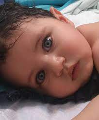 Something extremely rare happened to a couple in london: Black Curly Hair Blue Eyes Baby Novocom Top