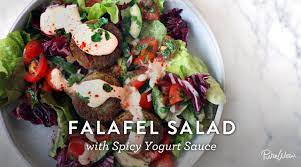 Falafel Salad With Spicy Yogurt Sauce Recipe Falafel Salad Recipes Weeknight Dinner Recipe
