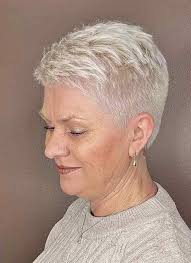 Why is hair length seen as feminine or masculine?