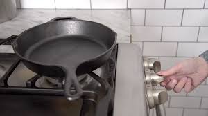 The Key To Cleaning A Cast Iron Pan Video Cleaning Cast Iron Skillet Cleaning Cast Iron Pans Seasoned Cast Iron Pan