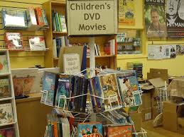 When planning a family movie night, nothing spoils the fun like arguing over what's appropriate to watch. 1170x2532px Free Download Hd Wallpaper Dvds Movies Children Kids Spinner Rack Display Store Wallpaper Flare